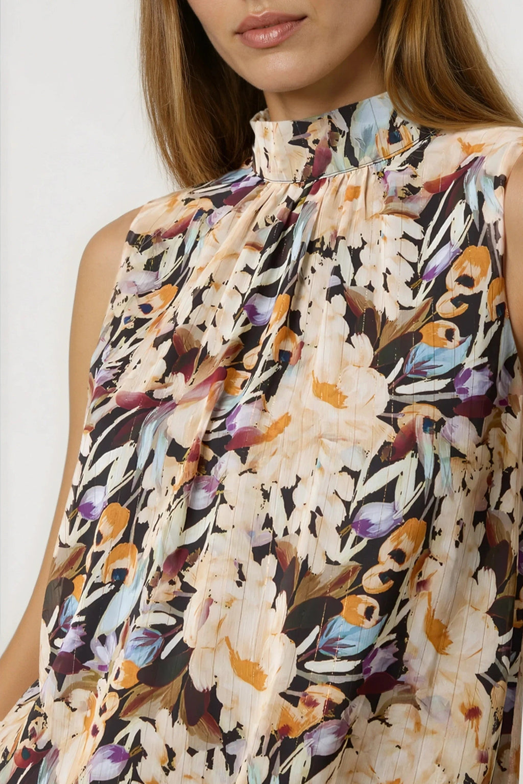 Floral Print Sleeveless High Neck Puff Hem Blouse